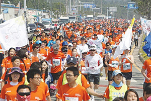 Pohang-si (Gyeongbuk-do) Municipal Chapter holds beach marathon wishing for unification