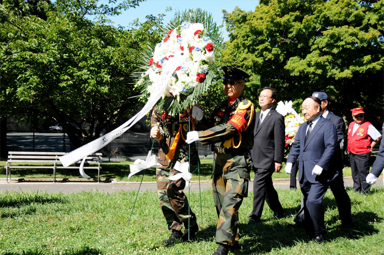 Laid flowers on the Monument of Participating in the Korean War at Kissena Park in New York, N.Y. Aug. 14