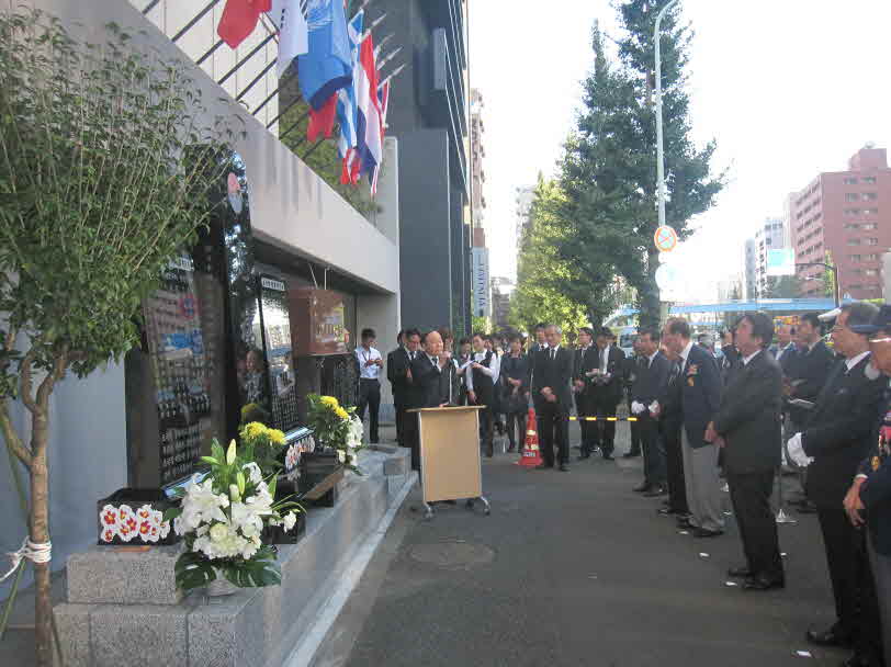 Hyun Kyung-dae, Executive Vice Chairperson of NUAC, at the unveiling ceremony of the memorial stone